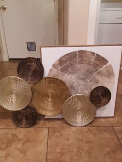 24x24 and 39x 22 bronze color metal art work