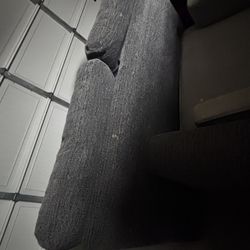 Blue Couch Sits 3 With Ottoman And Storage. Has A Pull Out Making It Bigger. 