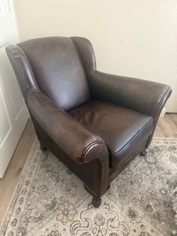 LEATHER CHAIRS AND OTTOMAN