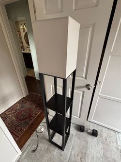 Corner lamp with shelves