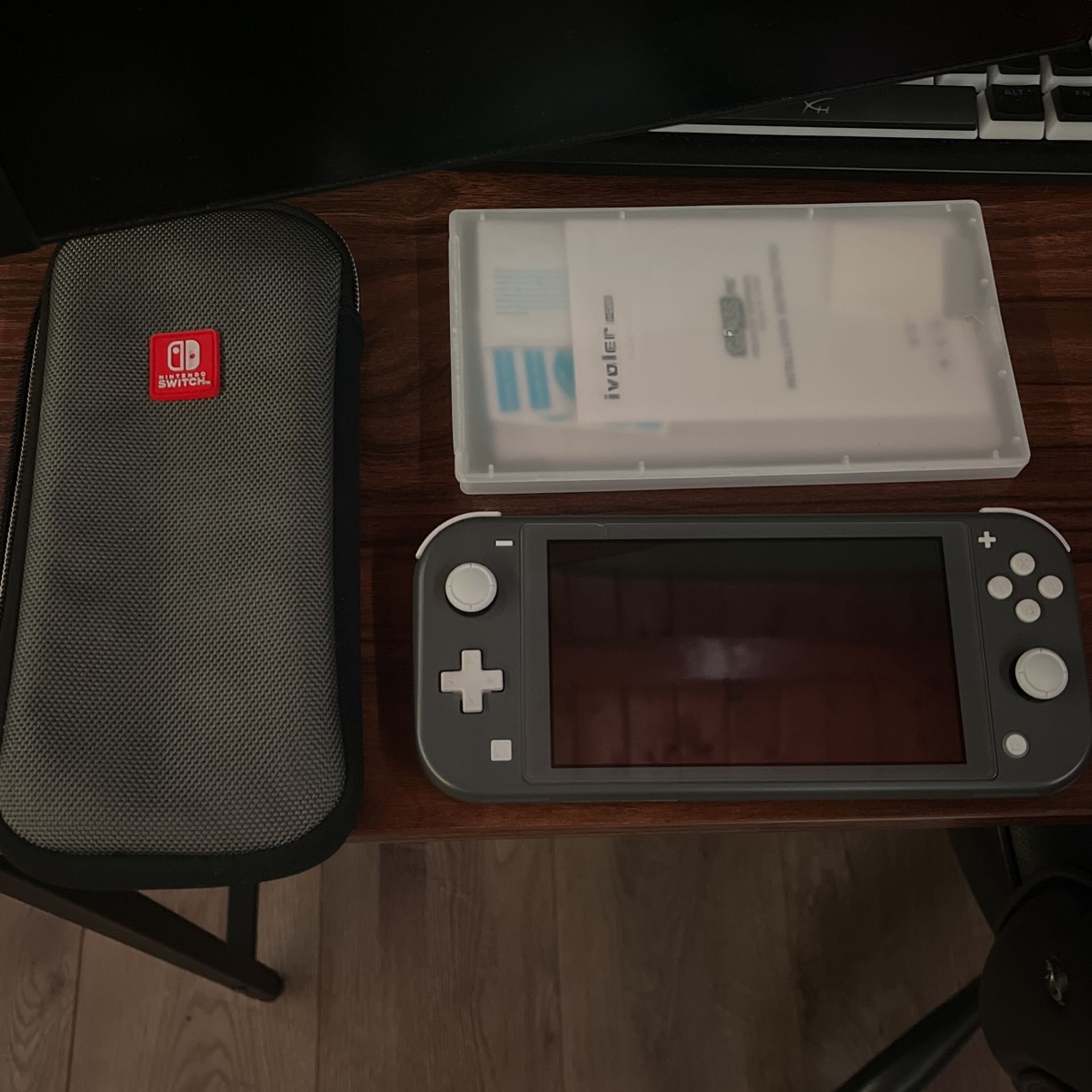 Switch Lite, Carrying Case & (2) Screen Protectors