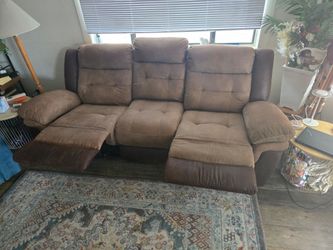 Couch with manual  foot rests