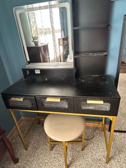 Black & Gold Makeup Vanity with Mirror, Shelves & Stool – $120 OBO  Almost brand new! Beautiful modern black and gold vanity set featuring a matching