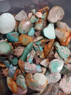 Plastic container full of turquoise