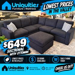 Black linen sectional with ottoman