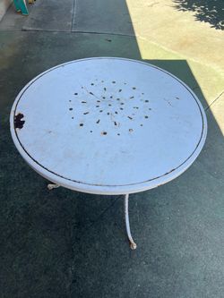 Round wrought iron table