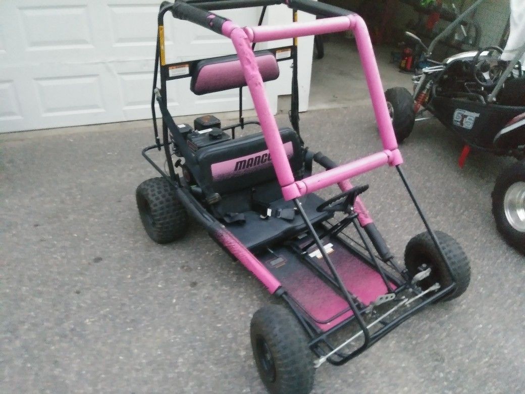 MANCO 2 SEATER GO KART. PREDATOR 212CC ENGINE THAT RUNS GREAT NEEDS CABLES ADJUSTED AND MINOR THINGS. VERY FAST