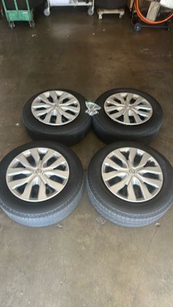 17” rims Nissan Rogue with hubcaps firm price,,,