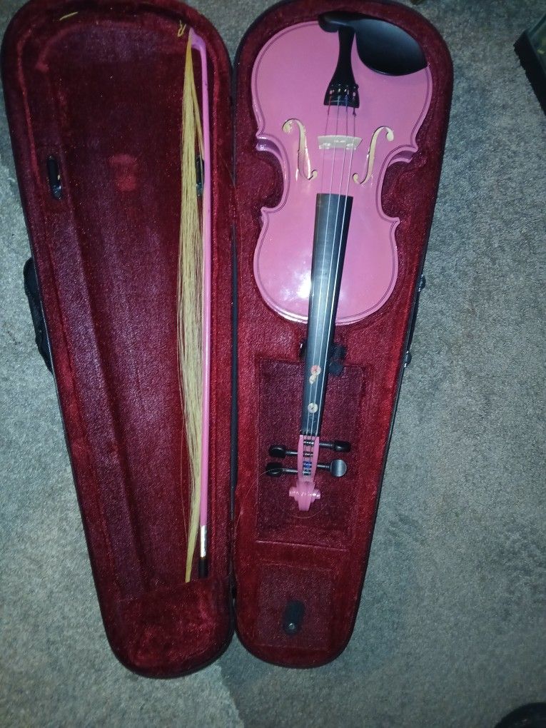 Violin with case.