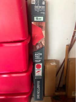 New 9 foot auto tilt patio umbrella red