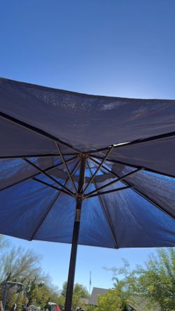 Patio umbrella with stand 8 feet high by 8 feet across
