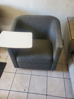 Chair with small table