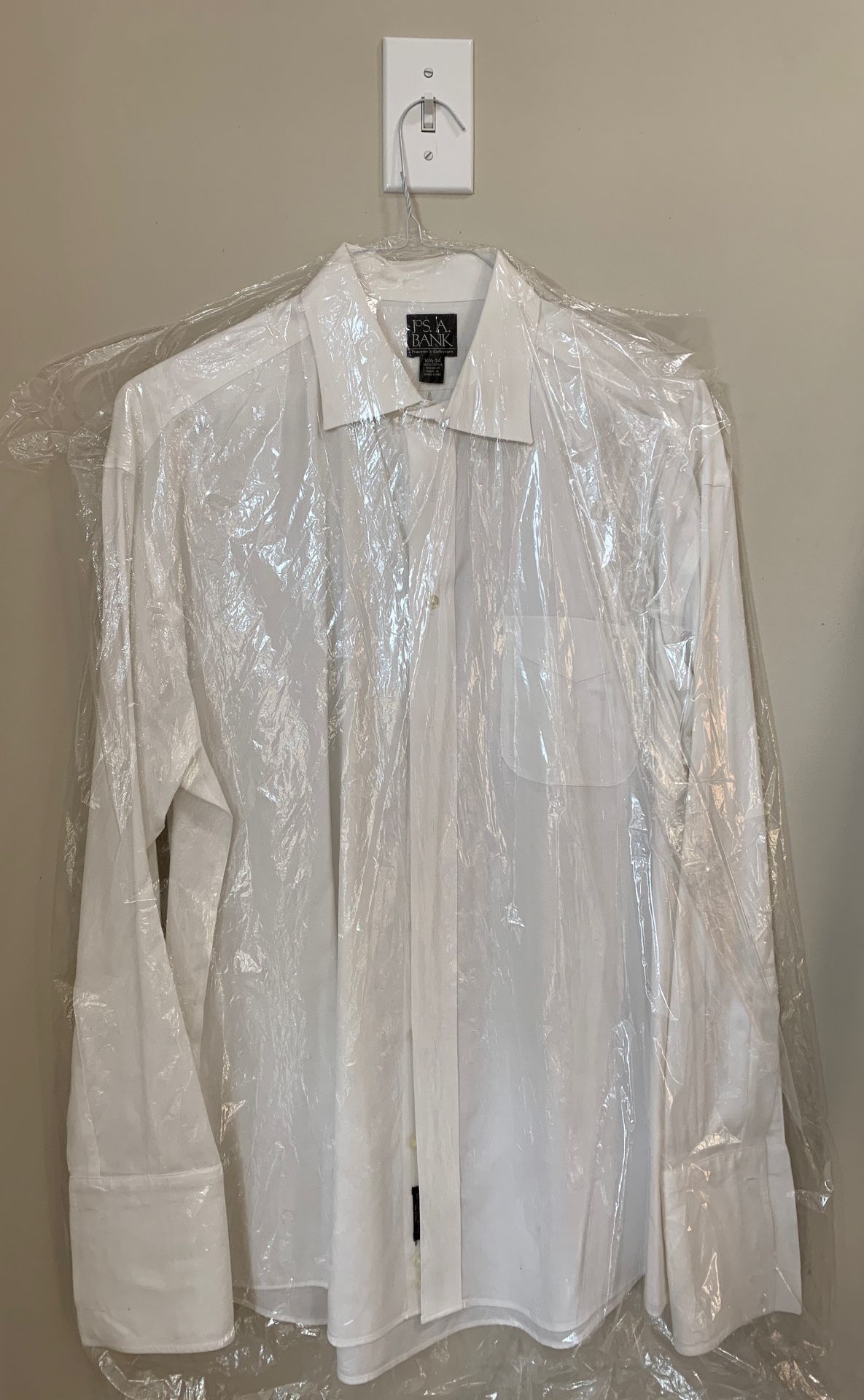 Dry cleaned branded white dress shirt