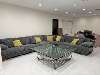 Gray sectional couch in pristine condition