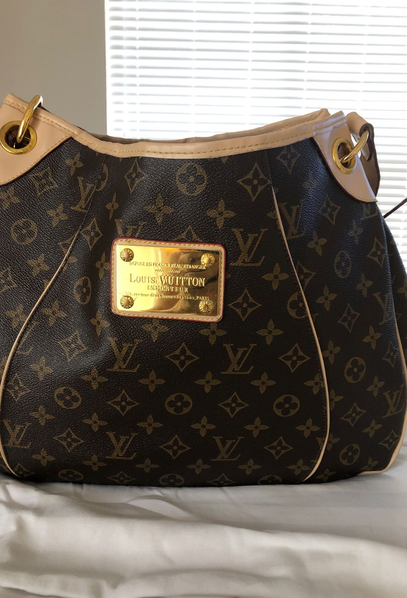 Louis Vuitton bag valued at $1200 I’m selling for 700 in good condition and worth every penny then I spent for it