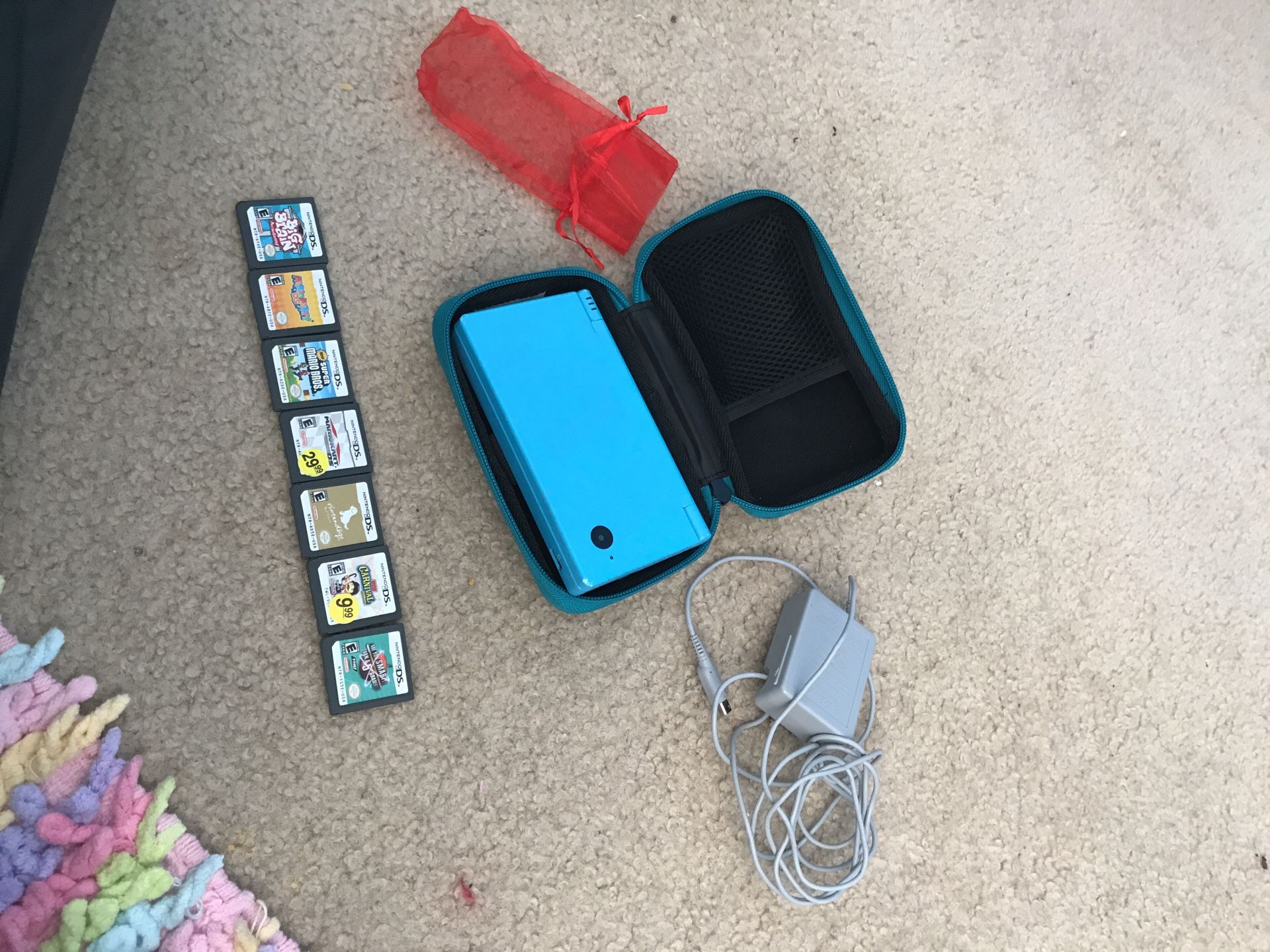 Nintendo Dsi comes with case & 7 games