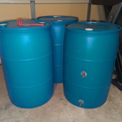 Like-new 55-gallon water barrels