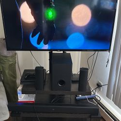 Tv TLC 50” With Stand And Home Theater