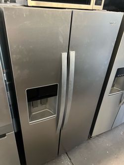 Whirloool refrigerator side by side