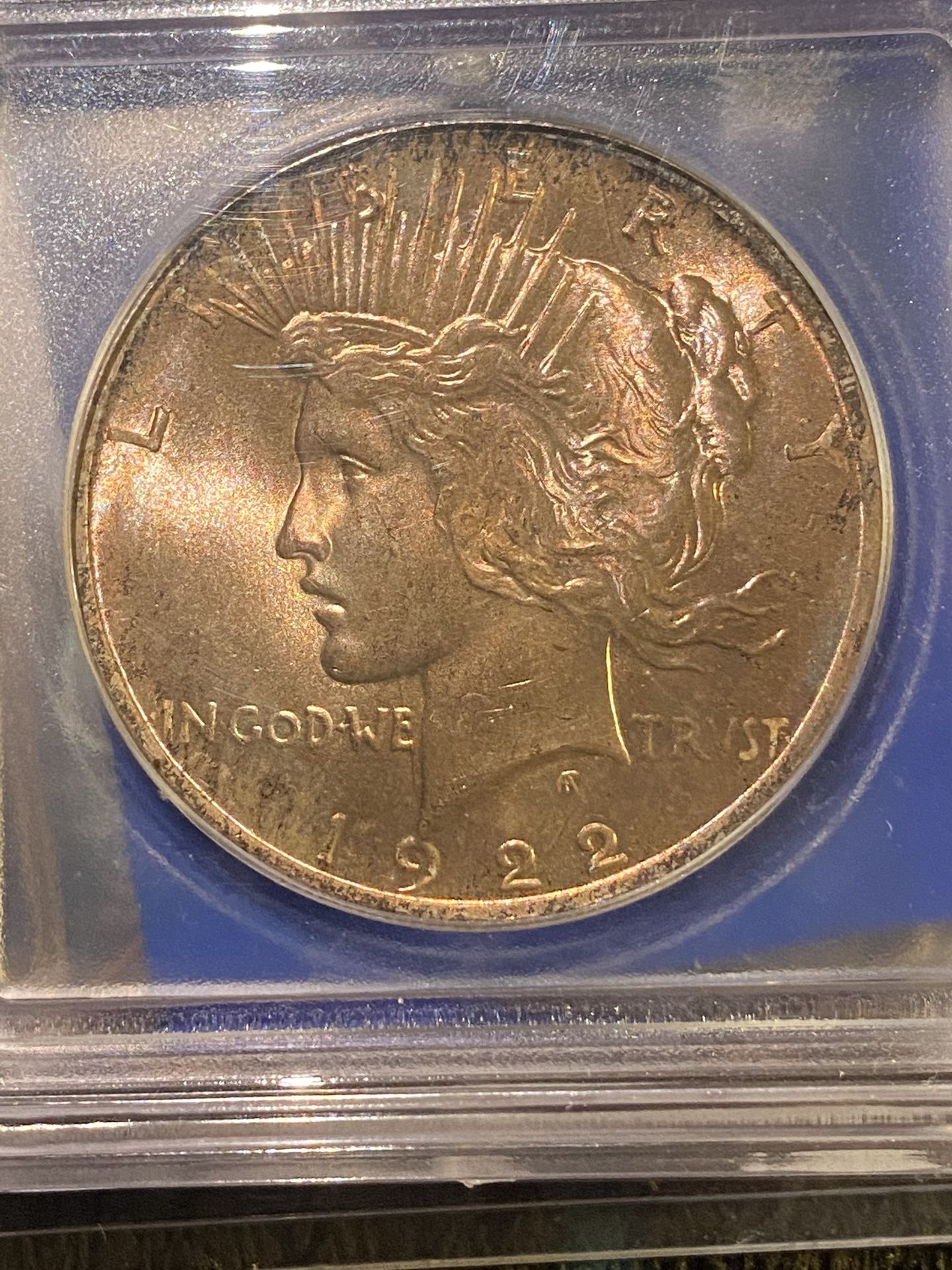 1922 golden toned ICG ms65 one dollar piece, silver dollar