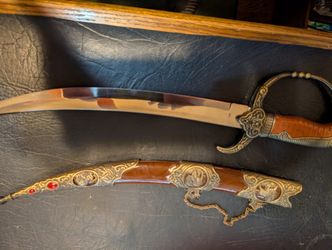 10.5 inch dagger with sheath.