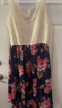 Teenager dress it’s long at the back and short at the front.