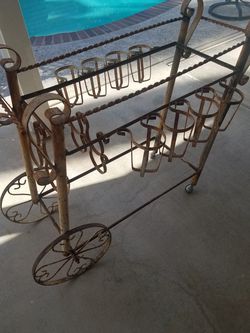 $325 obo .Vintage Ornate metal , wrought iron beverage / flower cart