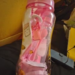 Infant bottle,bib and bank set.