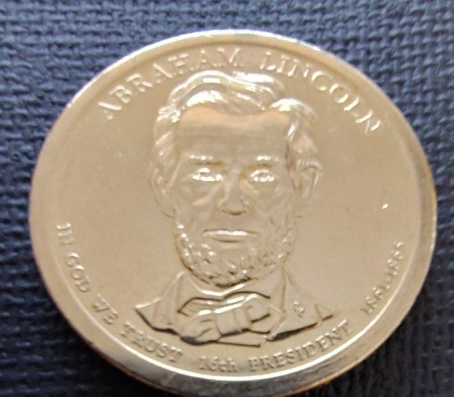 2-Presidential Gold Tone Coins Abraham Lincoln & Rutherford Hayes In Very Good Circulated Condition.