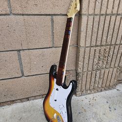 Harmonix Rock Band 2 Fender Stratocaster wireless guitar controller, often used with the Nintendo Wii or Xbox 360