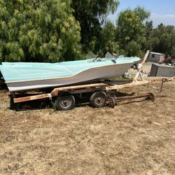 Runaround, Sue, vintage classic fiberglass boat And trailer