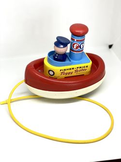 Fisher PriceVINTAGE1967 Tuggy Tooter Boat Pull Toy for Sale in