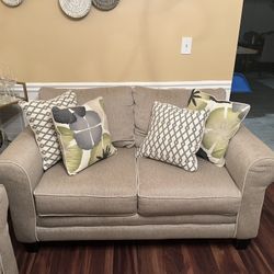 Sofa Loveseat And Ottoman Set.