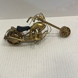 This item is a handcrafted metal art sculpture of a Harley-Davidson chopper motorcycle