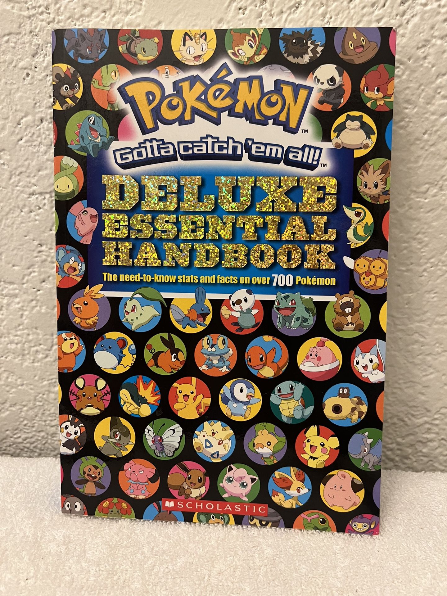 Pokemon Deluxe Essential Handbook Cris Silvestri 2015 1st Printing Scholastic.   Like new! 