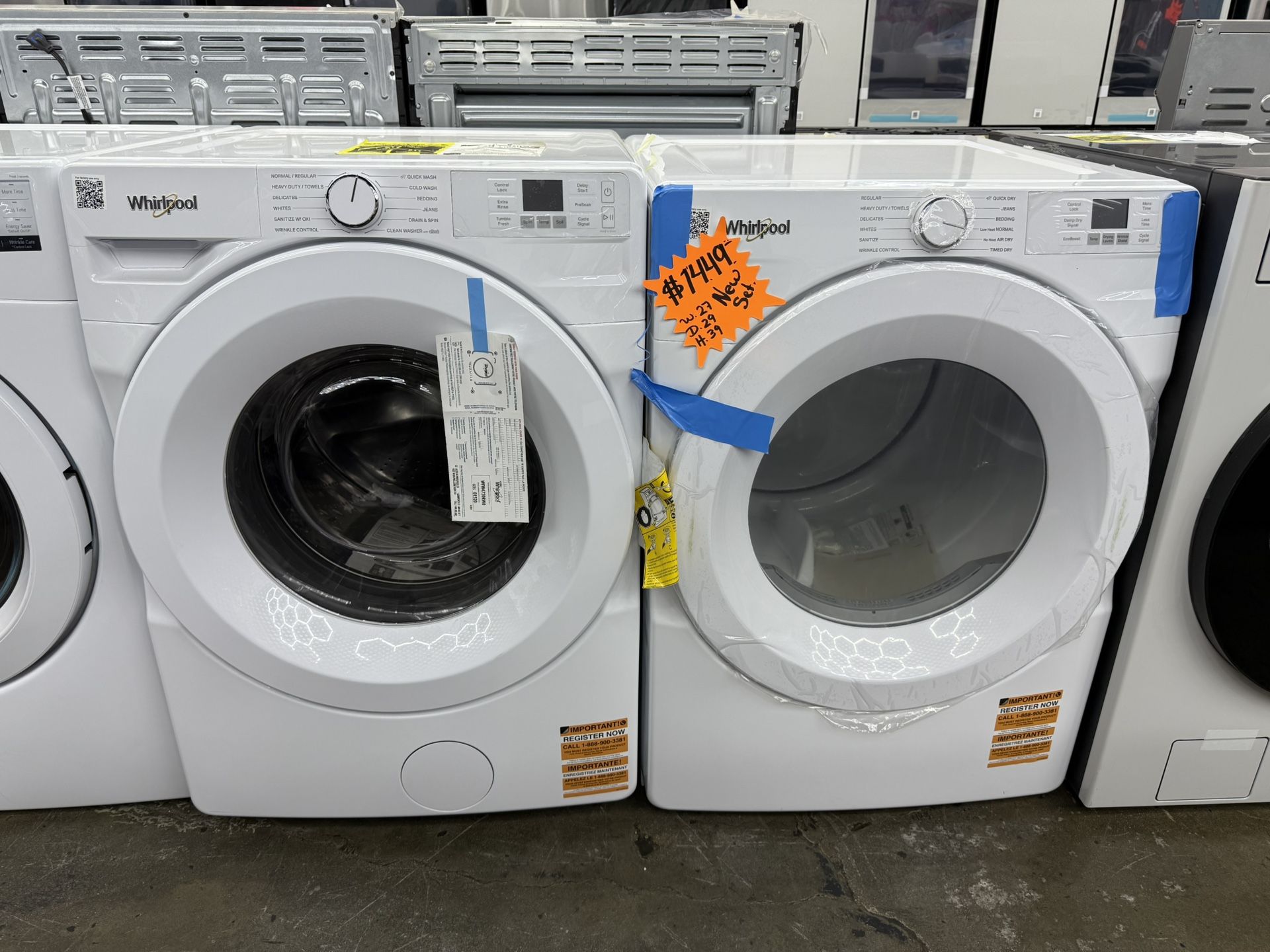 Brand new Whirlpool white front load washer and gas dryer set