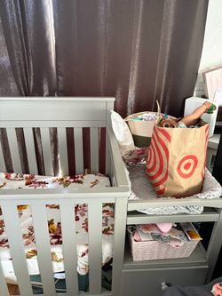 Crib with changing table