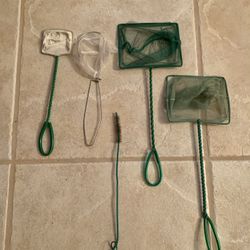 Preowned set of misc scoop nets for fish tank