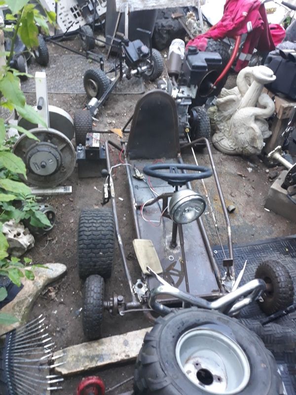 A vintage Van fiberglass gokart body and a race car fiberglass body