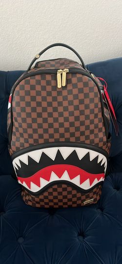 Spray ground backpack