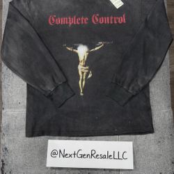 Hard graphic long sleeve featuring “Complete Control” text across the chest with a bold crucifix graphic. Dark washed black/charcoal tone gives it tha