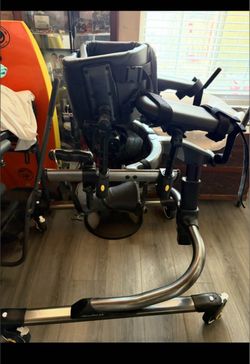 Rifton Pacer Gait Trainer and standing frame shadow sit to stand easy