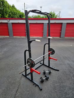 Fitness Sturdy  💯 Pounds+Bar+Weights Plates+ Pull Up Tower-Deeps Station+ Dumbbells. Deliveryfee.

Versatile home gym set includes a black steel powe
