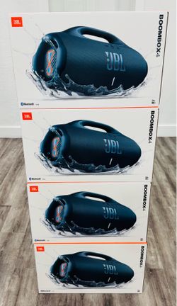New JBL Boombox 4 portable speaker. This black speaker is IP67 waterproof and dustproof with up to 24 hours of playtime. It has a built-in powerbank a
