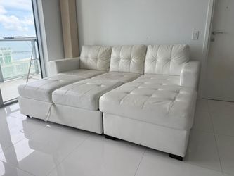 El Dorado White Leatherette sectional sleeper with right chase