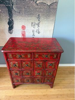 apothecary chest featuring 16 drawers