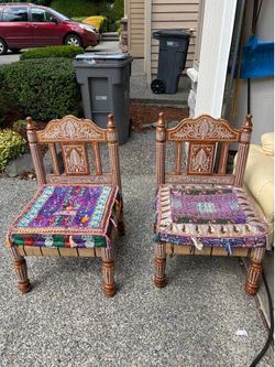 Pair of Hand-Carved Wooden Accent Chairs with Embroidered Cushions