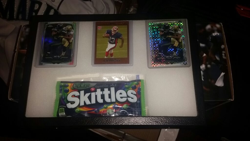 Seattle seahawks limited edition skittles with Marshawns.Rookie card framed