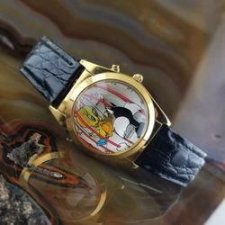 1995 Warner Brothers Looney Tunes MUSICAL Tweety Bird Sylvester Watch