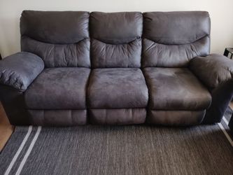 DarkBrown Ashley Furniture Reclining Sofa and Recling Loveseat Set